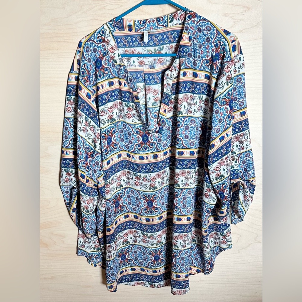 Cato Women’s size 26/28 W multi colored dress shirt.